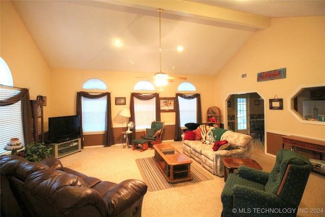 carpeted living room featuring beamed ceiling, plenty of natural light, ceiling fan, and high vaulted ceiling