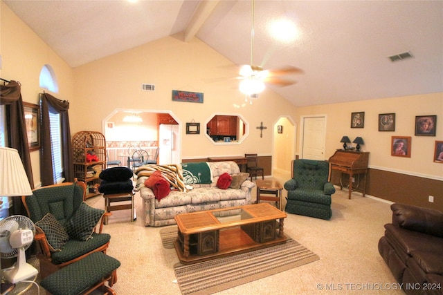 living room with beam ceiling, ceiling fan, high vaulted ceiling, and carpet