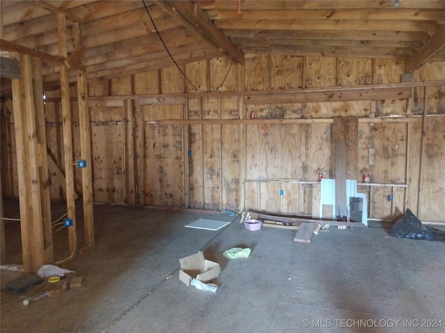 miscellaneous room featuring lofted ceiling