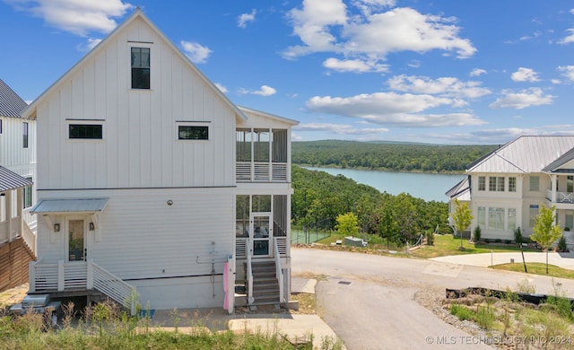 exterior space with a water view