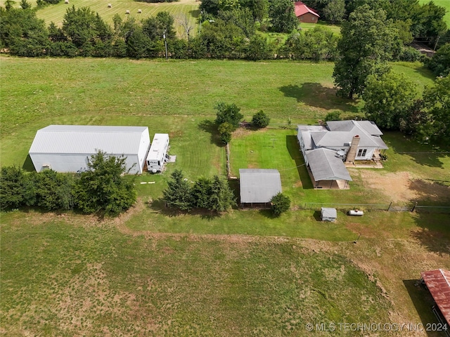 birds eye view of property featuring a rural view