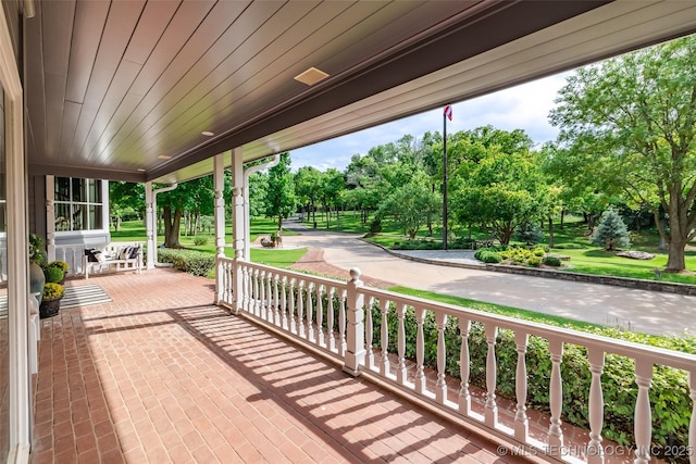 view of patio featuring a porch