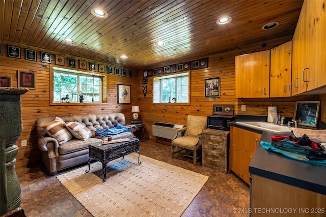 living area with wood walls, wood ceiling, an AC wall unit, and recessed lighting