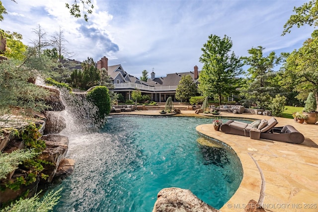 pool with a patio