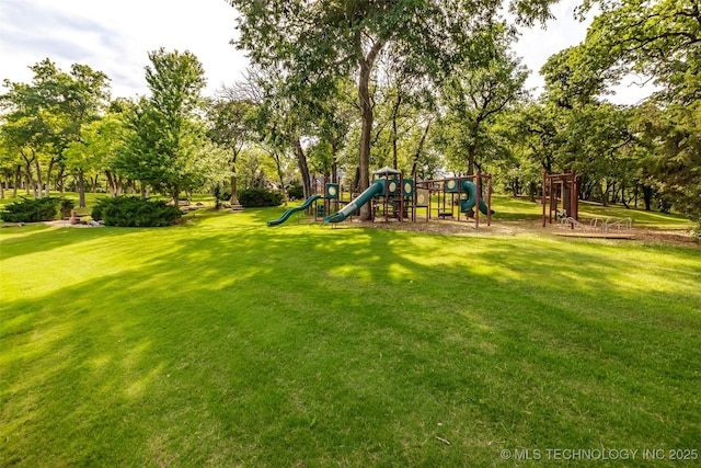 communal playground with a lawn