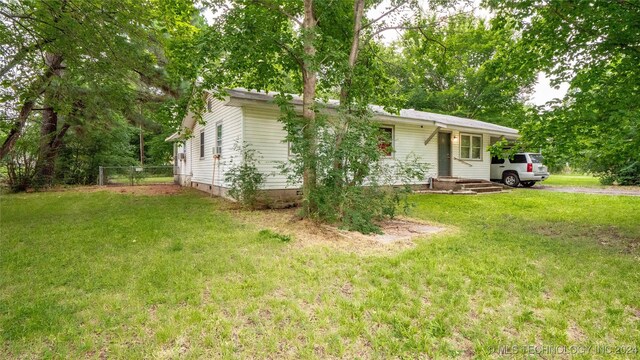 exterior space featuring a front lawn