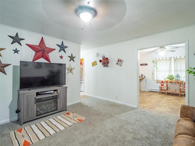 living room featuring carpet flooring and ceiling fan