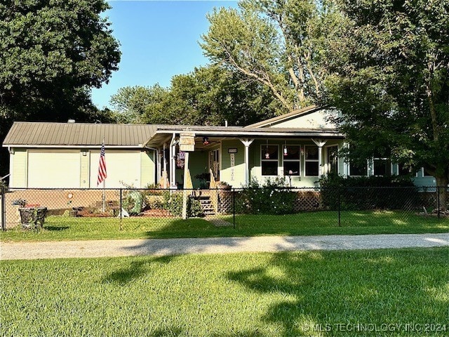 view of front of house with a front yard and a porch