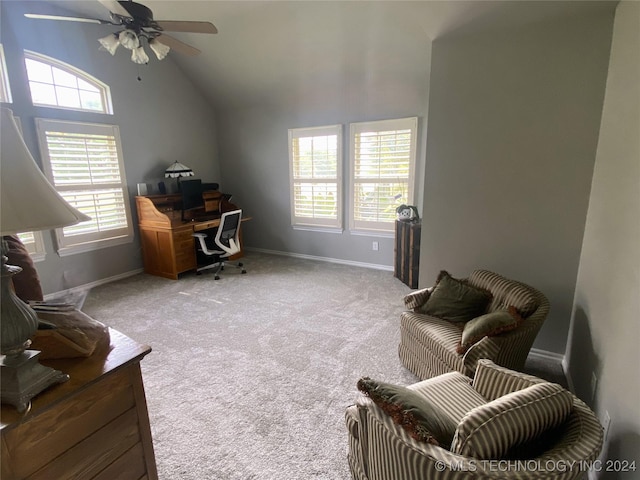 office area with light carpet, ceiling fan, baseboards, and a healthy amount of sunlight