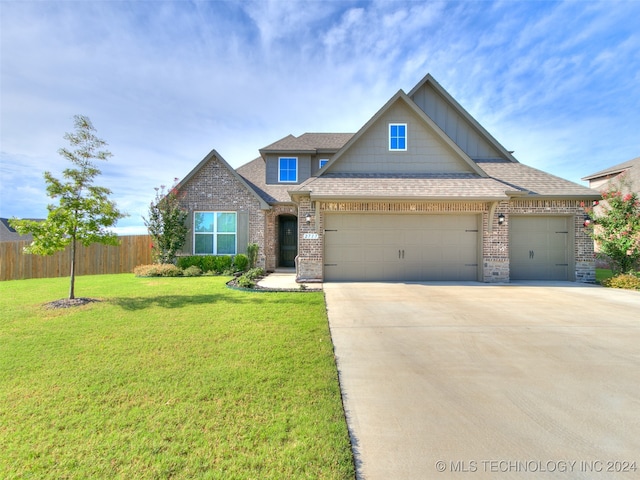 craftsman house featuring a front lawn