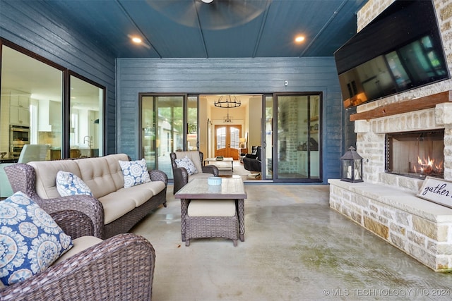 interior space featuring a stone fireplace