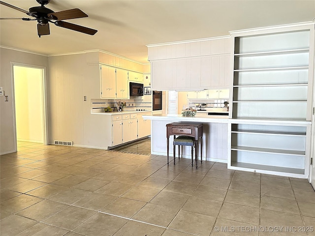 kitchen with black appliances, white cabinetry, light tile patterned flooring, ceiling fan, and crown molding