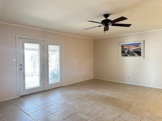 tiled spare room with ceiling fan, a healthy amount of sunlight, and crown molding