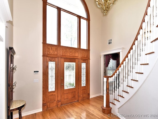 13706 S 18th St, Bixby, OK 74008 - foyer with a towering ceiling and light hardwood / wood-style flooring