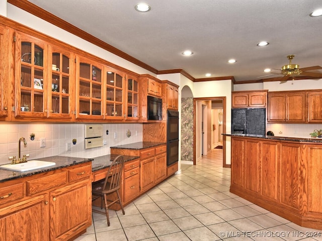 13706 S 18th St, Bixby, OK 74008 - kitchen with sink, crown molding, light tile patterned floors, black appliances, and dark stone counters