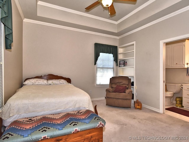 13706 S 18th St, Bixby, OK 74008 - carpeted bedroom featuring crown molding, ensuite bathroom, ceiling fan, and a tray ceiling