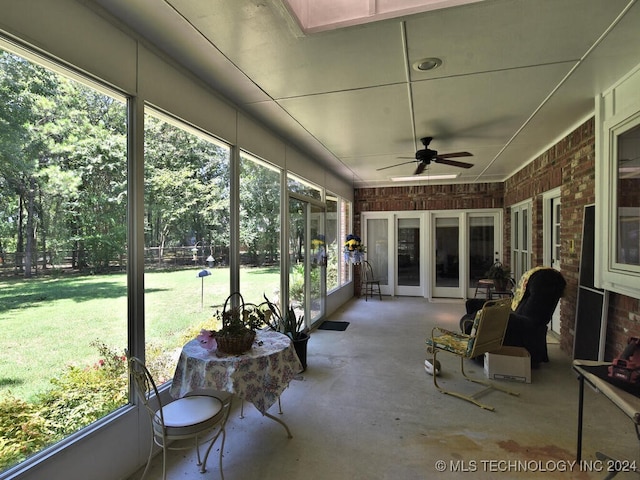 sunroom / solarium with ceiling fan and plenty of natural light