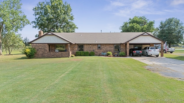 single story home with a front yard and a carport