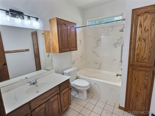 full bathroom featuring tile patterned floors, vanity, tub / shower combination, and toilet