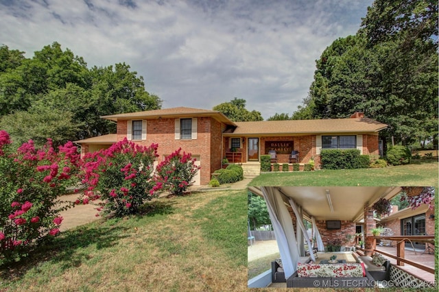 tri-level home with a front yard