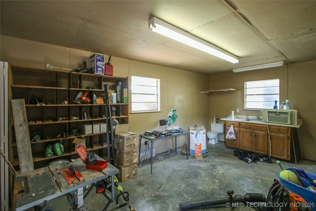 interior space with sink and concrete floors