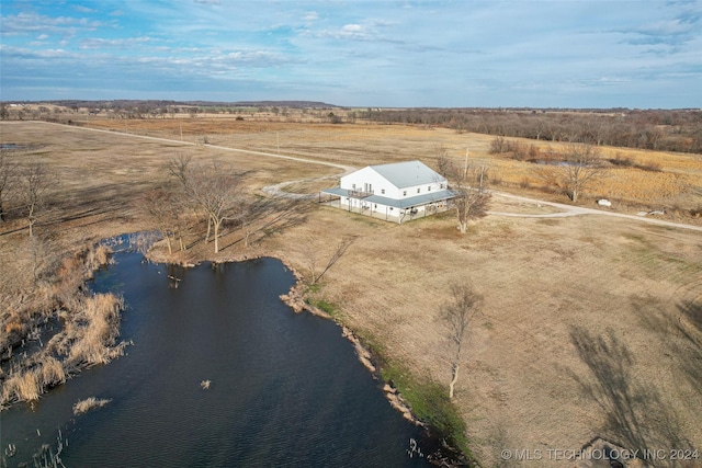 drone / aerial view featuring a water view and a rural view