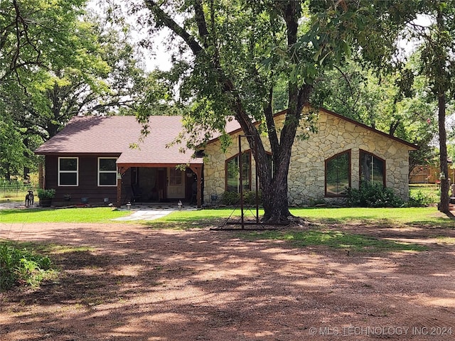 view of front of house featuring stone siding