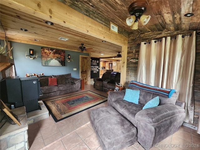 living area with recessed lighting, light tile patterned flooring, wood ceiling, and a ceiling fan