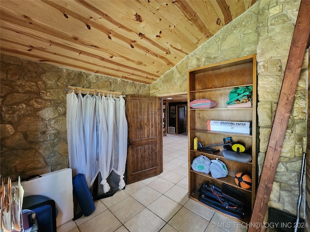 bathroom featuring lofted ceiling, wooden ceiling, and tile patterned floors