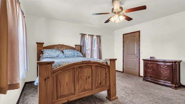 bedroom featuring ceiling fan and carpet floors