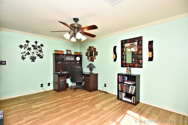 office featuring crown molding, light hardwood / wood-style flooring, and ceiling fan