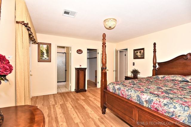 bedroom with light tile patterned flooring