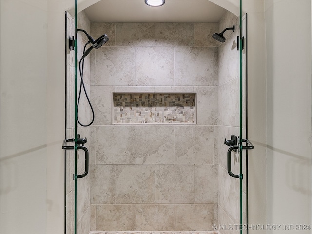 bathroom with an enclosed shower