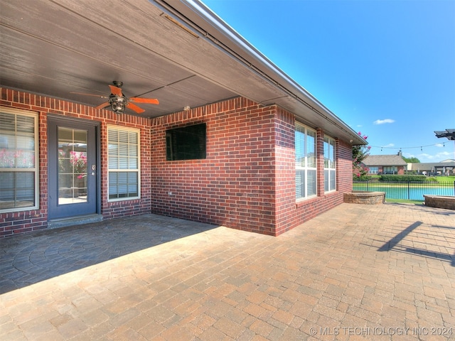 view of patio / terrace featuring ceiling fan