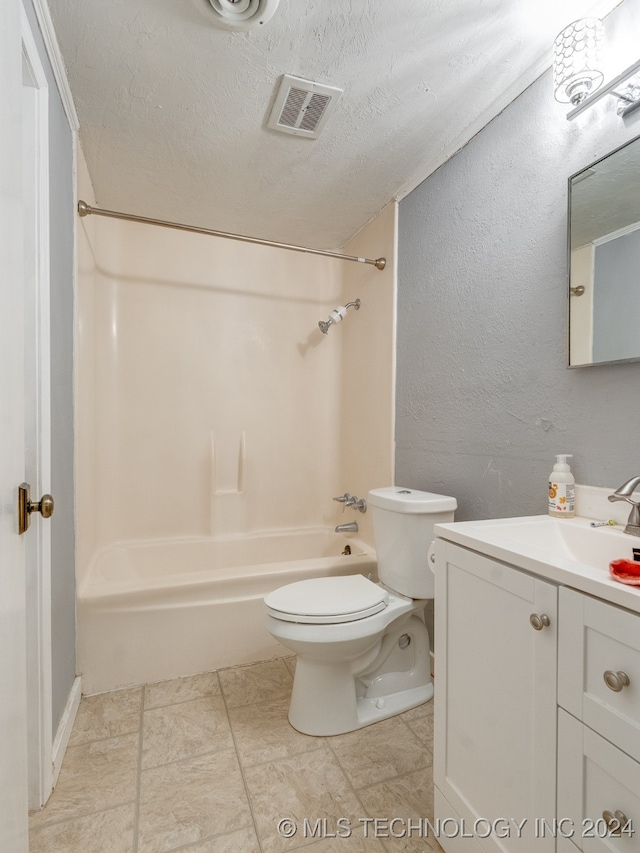 full bathroom with shower / bathtub combination, toilet, a textured ceiling, and vanity