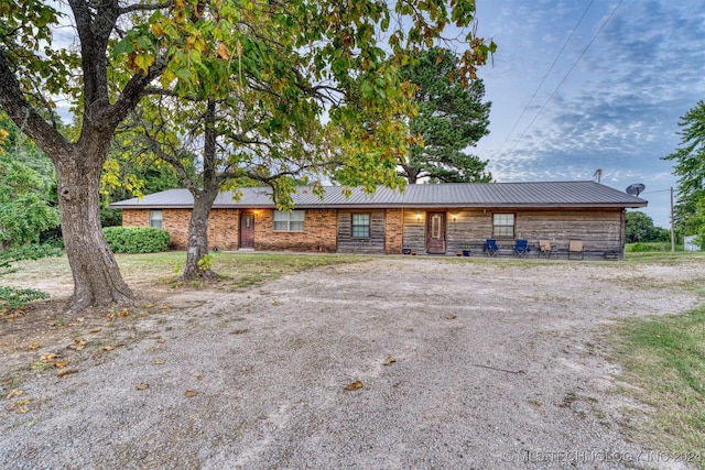 8248 E 122nd Rd, Wetumka, OK 74883 - ranch-style home featuring metal roof