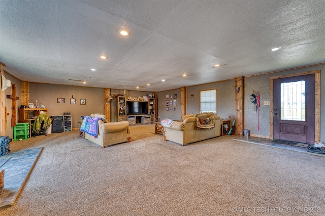 unfurnished living room with a textured ceiling and light colored carpet