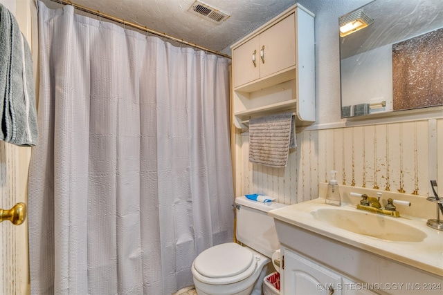 8248 E 122nd Rd, Wetumka, OK 74883 - bathroom featuring toilet and vanity