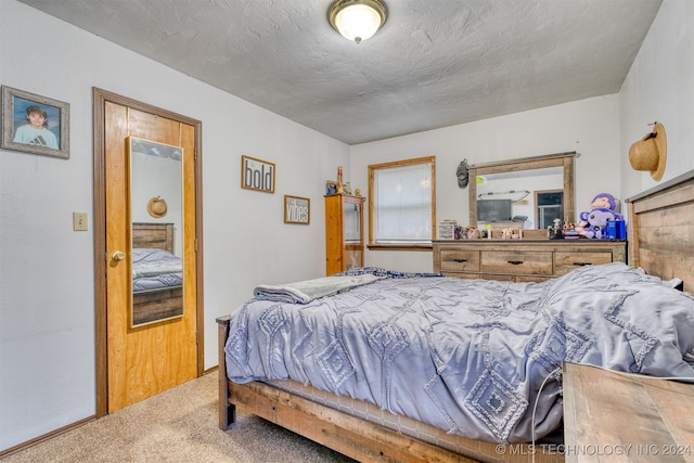 bedroom featuring carpet