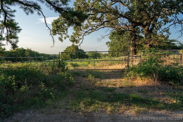 8248 E 122nd Rd, Wetumka, OK 74883 - view of yard featuring fence and a rural view