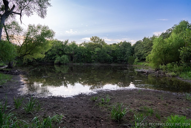 8248 E 122nd Rd, Wetumka, OK 74883 - water view featuring a heavily wooded area