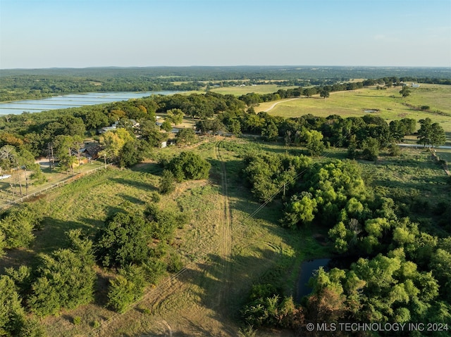 aerial view featuring a rural view and a water view