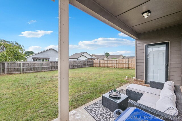 view of yard with a patio area and an outdoor living space