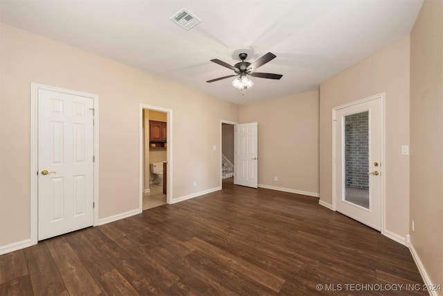 unfurnished bedroom with dark wood-type flooring, ceiling fan, access to exterior, and ensuite bath