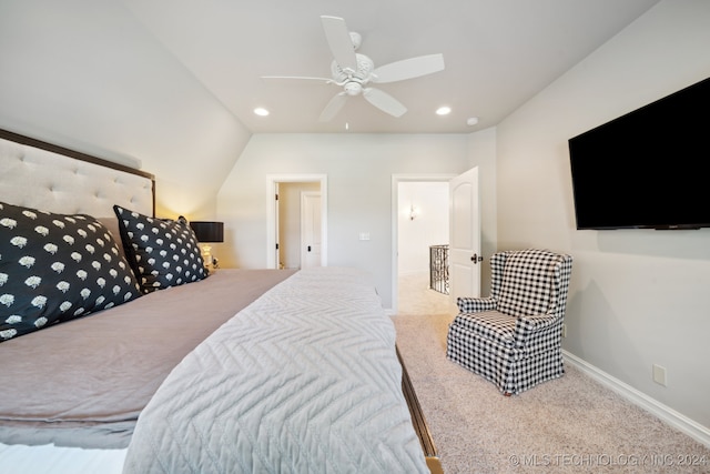 carpeted bedroom with ceiling fan and lofted ceiling