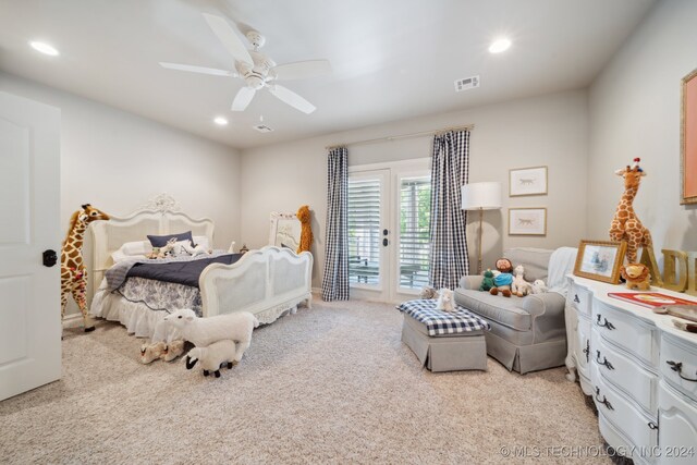 bedroom featuring ceiling fan, french doors, light carpet, and access to exterior