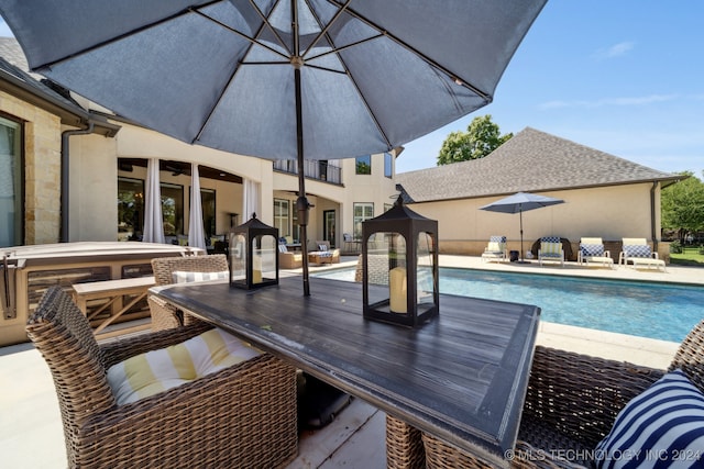 view of swimming pool featuring a patio