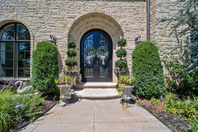 property entrance with french doors