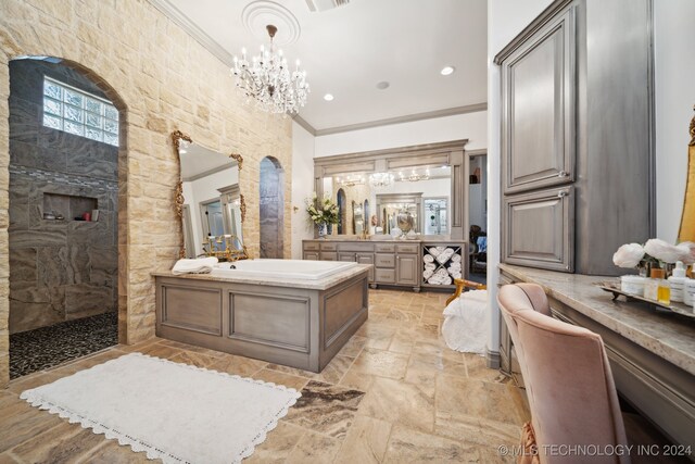 bathroom with shower with separate bathtub, vanity, tile patterned flooring, crown molding, and a notable chandelier