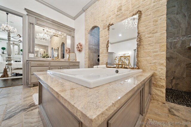 bathroom featuring a notable chandelier, tile patterned floors, vanity, tile walls, and crown molding